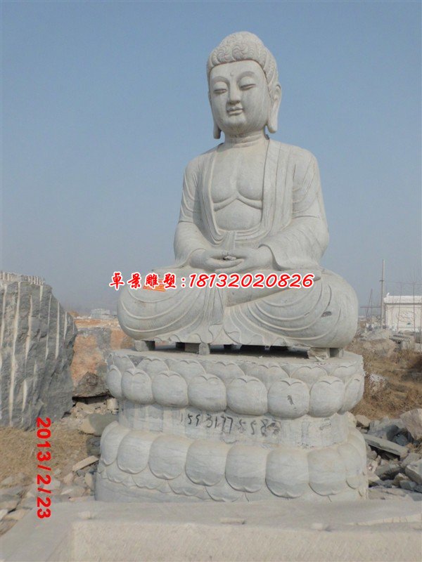 坐著的佛像雕塑，石雕如來佛祖