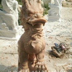 踩球麒麟雕塑，晚霞紅麒麟石雕