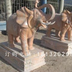 象鼻向上大象石雕，晚霞紅大象雕塑