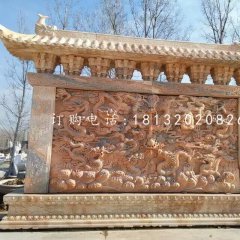 九龍影壁雕塑，晚霞紅石雕影壁