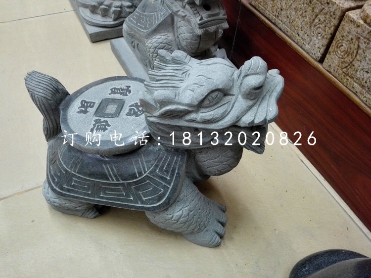 背著銅錢(qián)的龍龜石雕，青石龍龜
